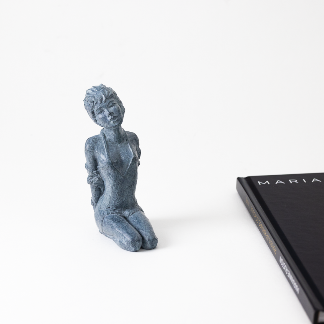 Bronze "Mélancolie" et livre dédicacé